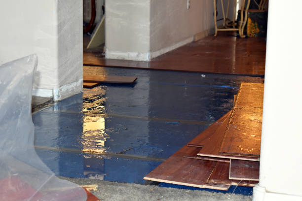Professional Flood Cleanup technician working in Sand Lake, NY